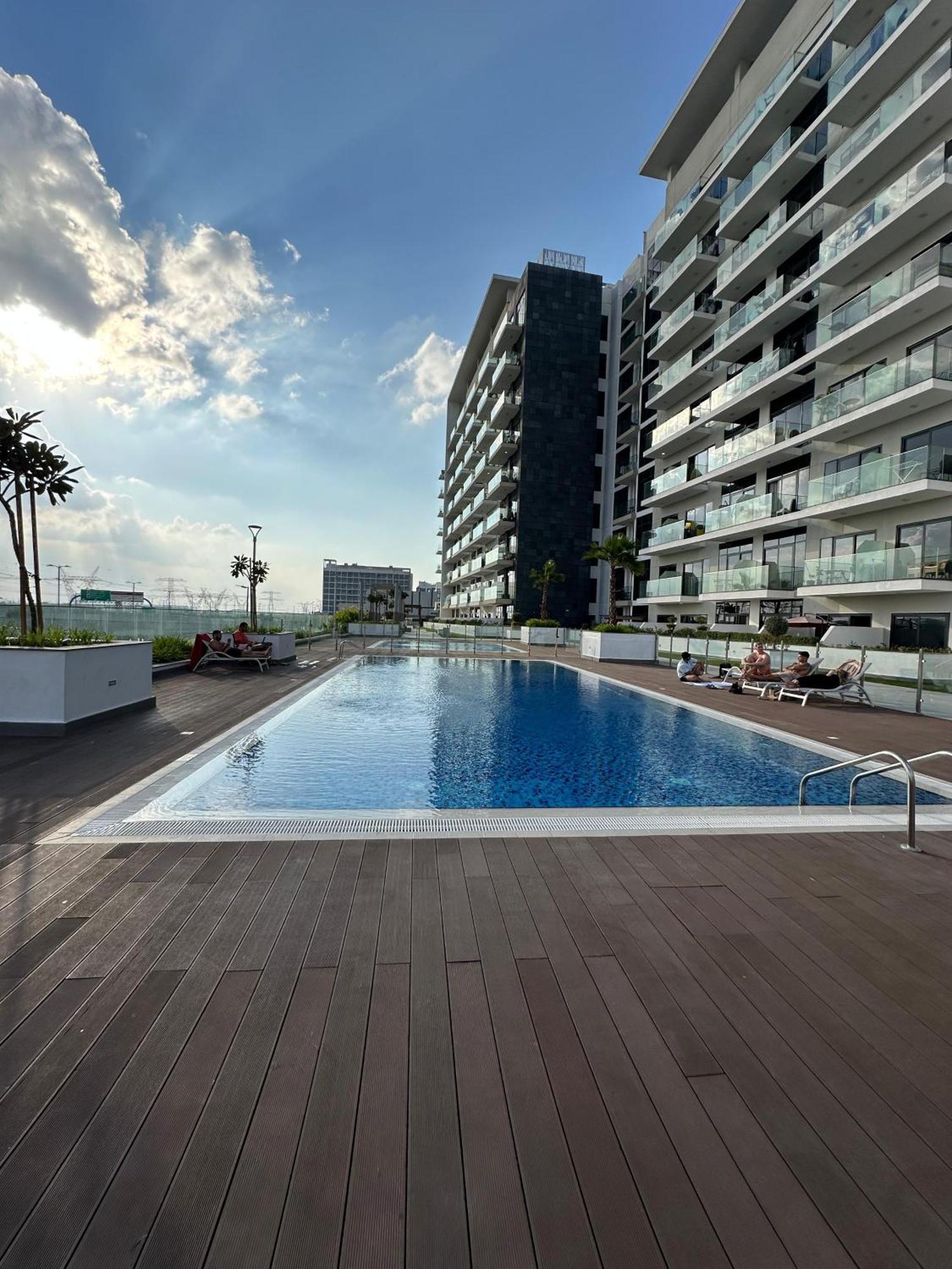 Tick - Contemporary With Balcony Azizi Riviera Dubai