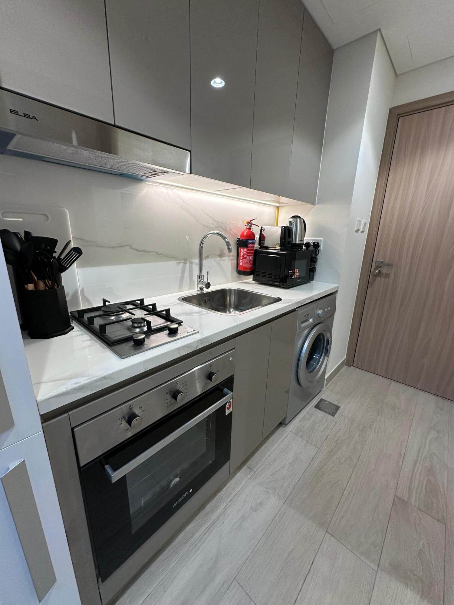 Tick - Contemporary With Balcony Azizi Riviera Dubai